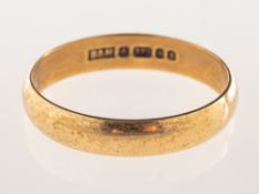 A 9ct gold wedding band, UK hallmark, size Q1/2, 2.4grams.