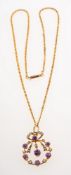 A Victorian amethyst and seed pearl pendant with chain,