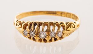 An antique 18ct gold five stone diamond ring, a Victorian/early 20th century ring,