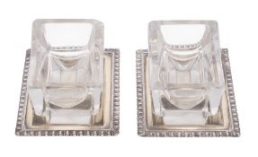 A pair of George IV North Country provincial silver salts or dishes, of shallow rectangular form,