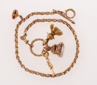 A fob chain with fob seals and a watch key, a belcher link fob chain with rope twist T-bar,