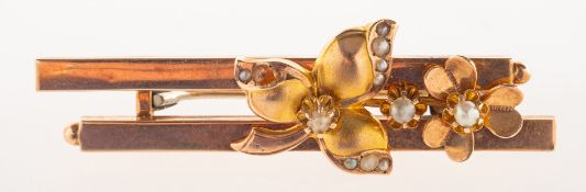 An antique floral seed pearl brooch, a double bar brooch with floral motifs,