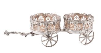 A Victorian silver plated double coaster trolley, with spoked wheels,