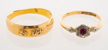 Two rings, including an 18ct gold band style ring with indistinct engraving, UK hallmark,