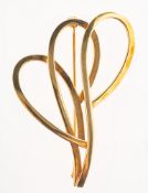 An openwork brooch, designed in the form of three entwined loops, marked 585,