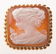 A 1970's 9ct gold cameo brooch, of rectangular form, the carved cameo depicting a lady with flowers,