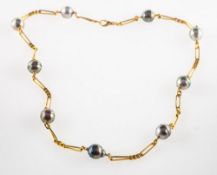 A Tahitian pearl necklace, the necklace of elongated links alternating with curb links,