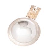 An Elizabeth II cased limited edition parcel-gilt dish, with a cast phoenix handle,