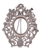 A Victorian silver photograph frame, shaped oval outline,