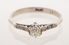 An Art Deco diamond ring, claw set to the centre with an old cushion-cut diamond, diamond approx. 0.