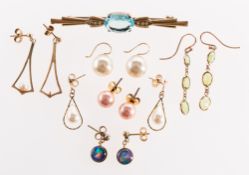 A mixed group of earrings, including a pair of long openwork drop earrings,