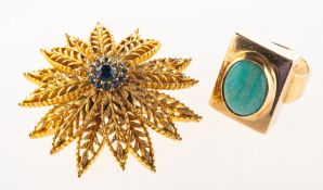 A mid-century dress ring and a Sphinx costume jewellery brooch,