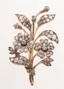 An antique diamond flower spray brooch, collet and grain set with old vari-cut diamonds,