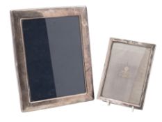 A modern silver mounted photograph frame, rectangular form and with an easel back,