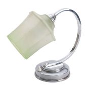 A metal and glass mounted desk lamp,