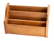 Workshop of Robert Mouseman Thompson (1876-1955): An English oak stationery rack,