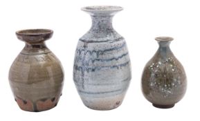 Three studio pottery vases comprising a shouldered stoneware vase by Micki Schloesslingk with