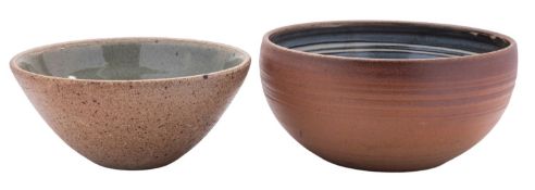 Winchcombe Pottery a stoneware bowl the interior with finger trailed decoration in blue over white,