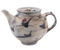 David and Margaret Frith a porcelain teapot and cover with painted manganese and lavender spotting