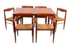 A Danish teak extending dining table and six chairs.