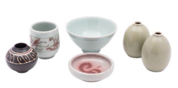 Six pieces of Bullers porcelain art pottery comprising two bowls and four vases,