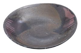 Terri Holman [Contemporary], a stoneware dish with arbitrary brown, white and purple glazes,