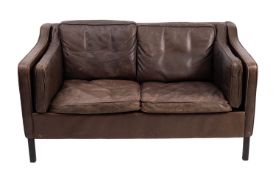 A two seat leather upholstered sofa in Borge Morgensen style.
