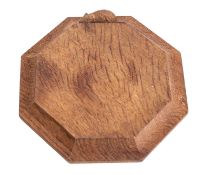 Workshop of Robert Mouseman Thompson (1876-1955): An octagonal English oak chopping board,