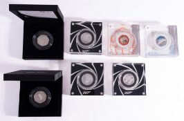 Three Royal Mint '007' half ounce silver coins,