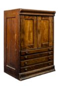 An early 20th century oak collectors' cabinet,