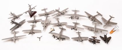 A collection of pewter and diecast models of military aircraft, including a Hurricane, Spitfire,