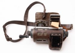 A mid 20th Century handheld ticketing machine.