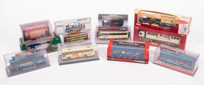 Twelve Corgi diecast vehicles.