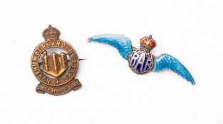 A silver and enamel RAF sweetheart brooch. Together with a Northumberland Hussars cap badge.