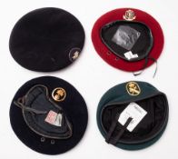 Four 20th Century French woollen berets. Three with metal cap badges including Grenadier Guards etc.