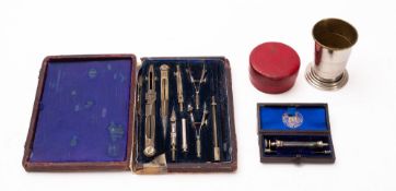 An early 20th century cased geometry set,