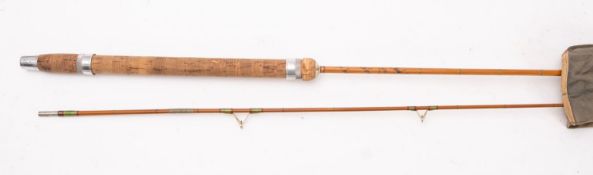 A Hardy Bros, Alnwick 'Wanless' two piece split cane fly fishing rod. In cloth bag.