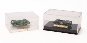 Two 1/43rd scale built white metal Aston martin DB models,