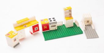 A collection of various loose Lego building blocks including part set 261.