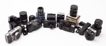 Three 35mm point and shoot cameras.