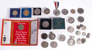 A collection of coins including a Maria Theresa Thaler, 1972 silver proof crown, 1981 proof crown,