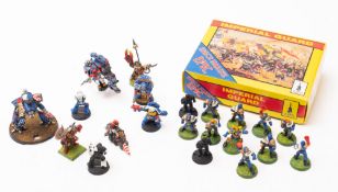 A collection of Games Workshop diecast Warhammer figures.