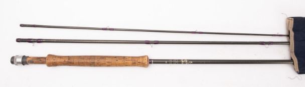 A Hardy Bros, Alnwick 'The Favourite' graphite two piece fly fishing rod. In cloth bag.