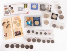 A mixed collection of British and Worldwide coins.