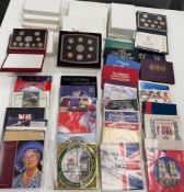 A collection of forty six coins sets from Great Britain.