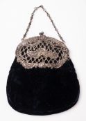 An Edwardian silver mounted black velvet evening bag, maker Samuel Jacob, London 1902,