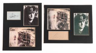 Two pieces of paper bearing the signature of Karl Donitz.