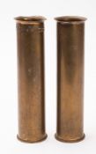 A pair of brass shell case vases. Stamped 1957 to the base, 25cm high.