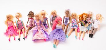 A Group of thirteen Barbie and similar fashion dolls, in various costumes,