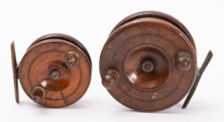 A 3 inch mahogany and brass star back reel, together with a 4 inch brass and mahogany reel (2) .
